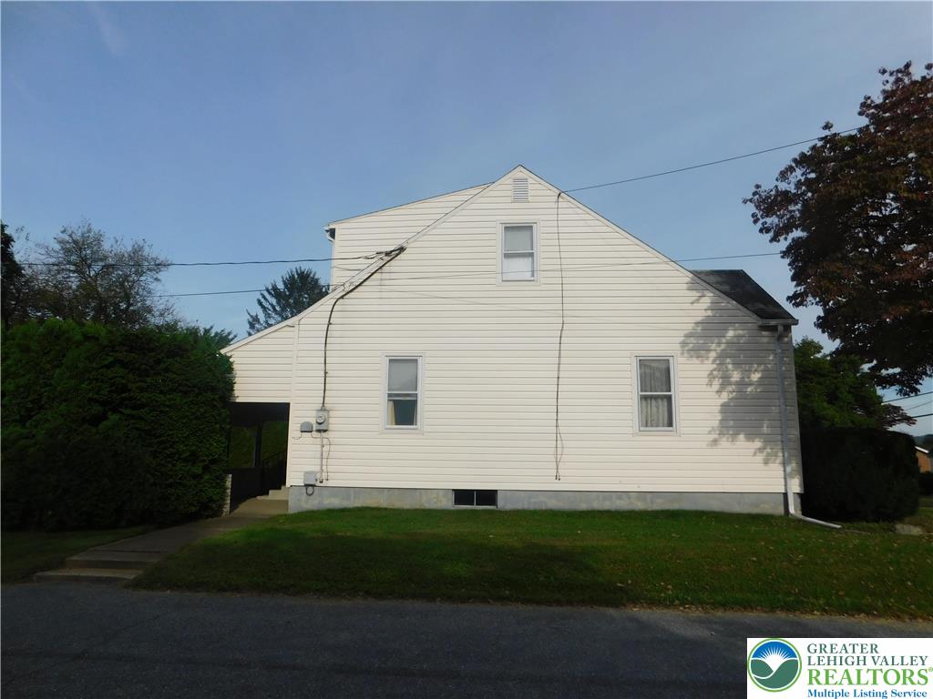 3023 Middletown Road Bethlehem, PA 18020 - Photo 24 of 28 a view of a white house next to a yard and trees