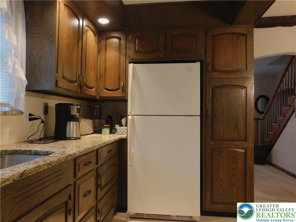 3023 Middletown Road Bethlehem, PA 18020 - Photo 10 of 28 a kitchen with a refrigerator and a sink
