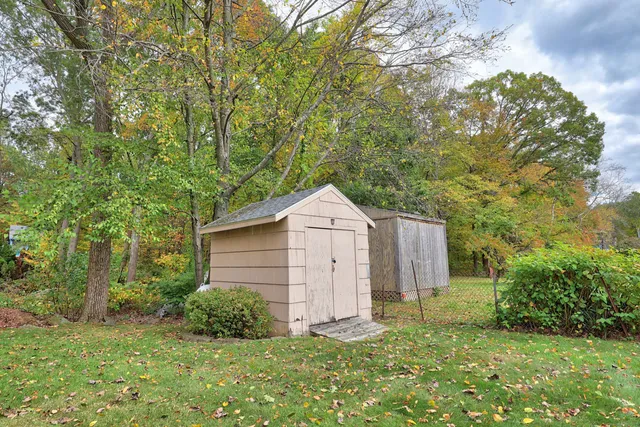 a view of a house with a back yard