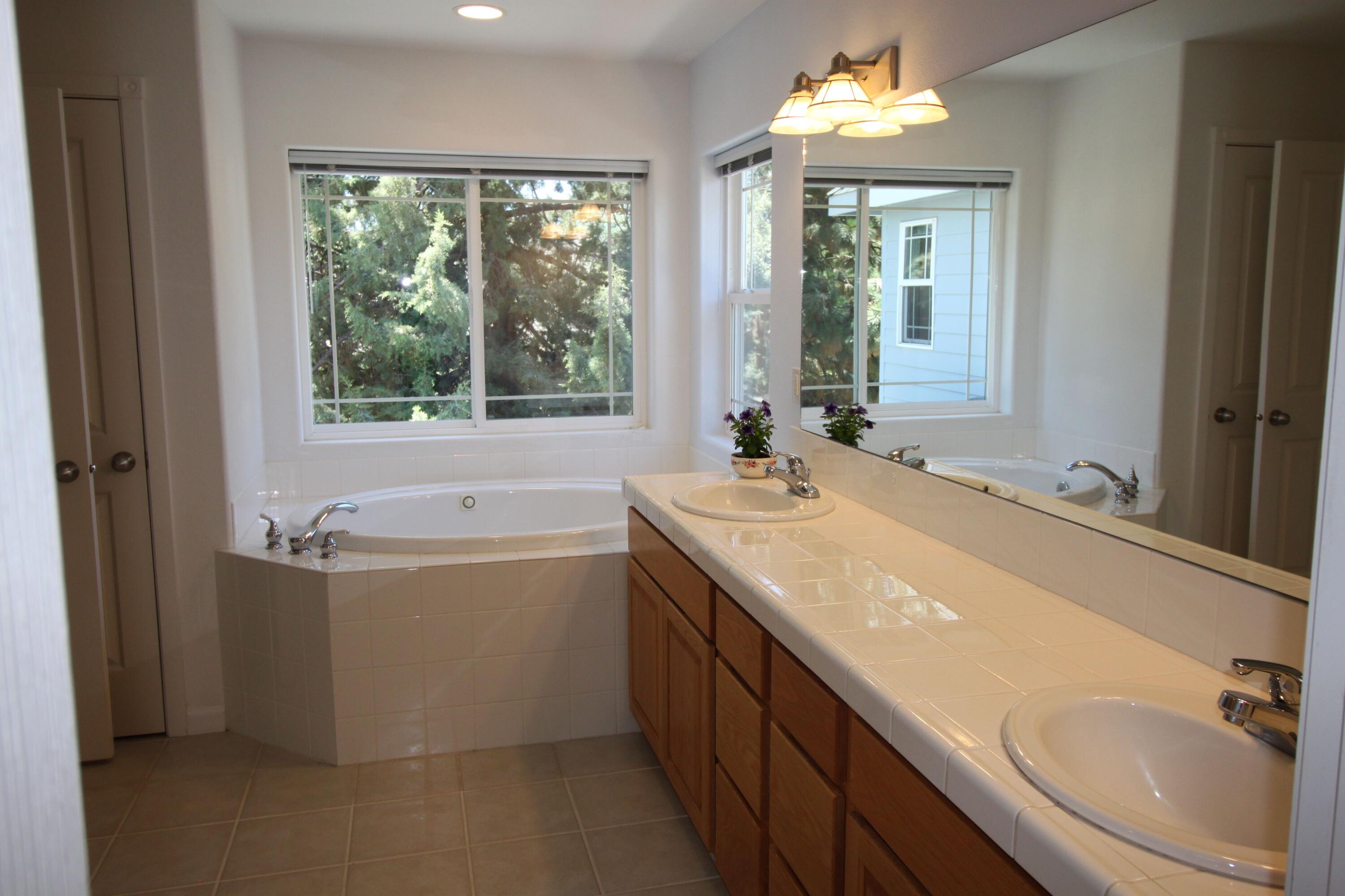 19846 Powers Road Bend, OR 97702 - Photo 17 of 20 Master bath double sinks tub