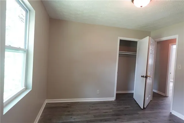 a view of walk in closet with window