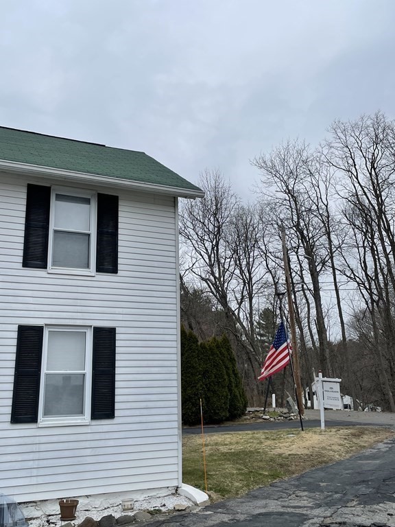 10 Eddy Street Ware, MA 01082 - Photo 19 of 20 a front view of a house with a yard