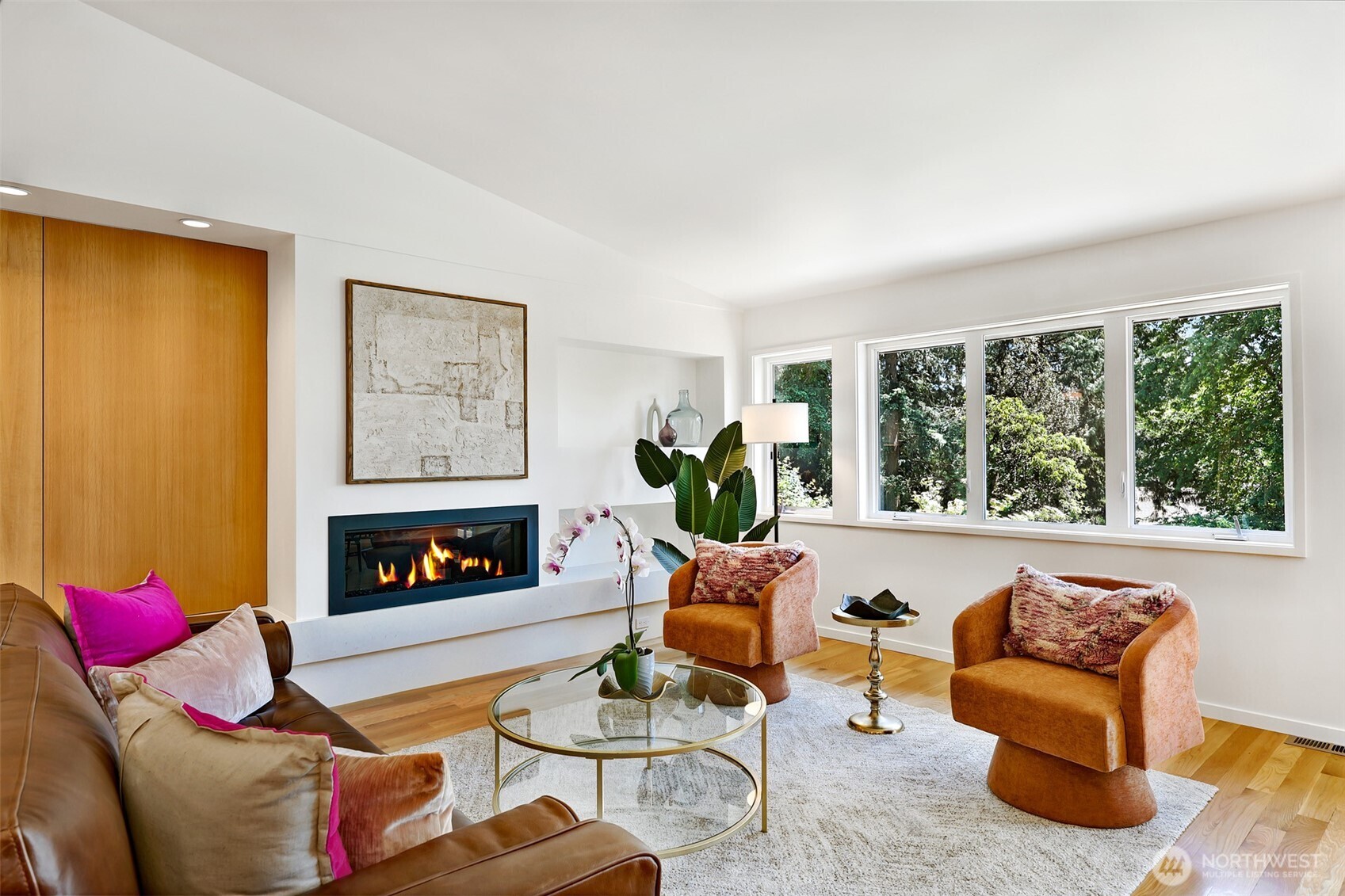 2547 Northeast 83rd Street Seattle, WA 98115 - Photo 18 of 38 a living room with furniture and a fireplace