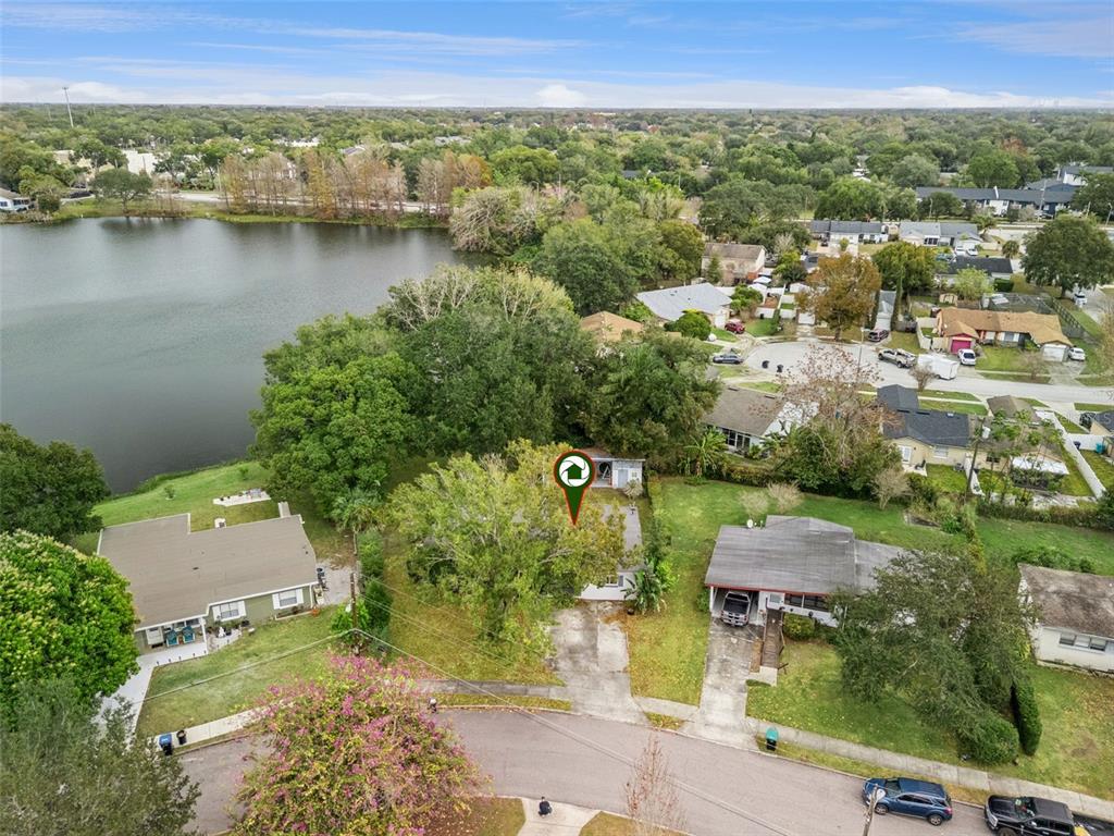 2819 Rogan Road Orlando, FL 32812 - Photo 23 of 28 an aerial view of residential house with outdoor space and lake view