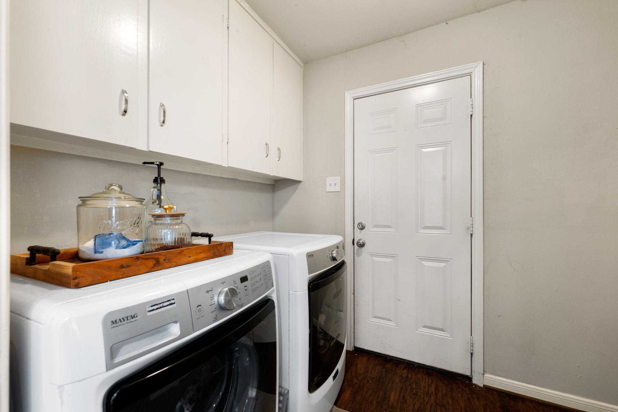 6019 Cartagena Street Houston, TX 77035 - Photo 18 of 29 a utility room with dryer and washer