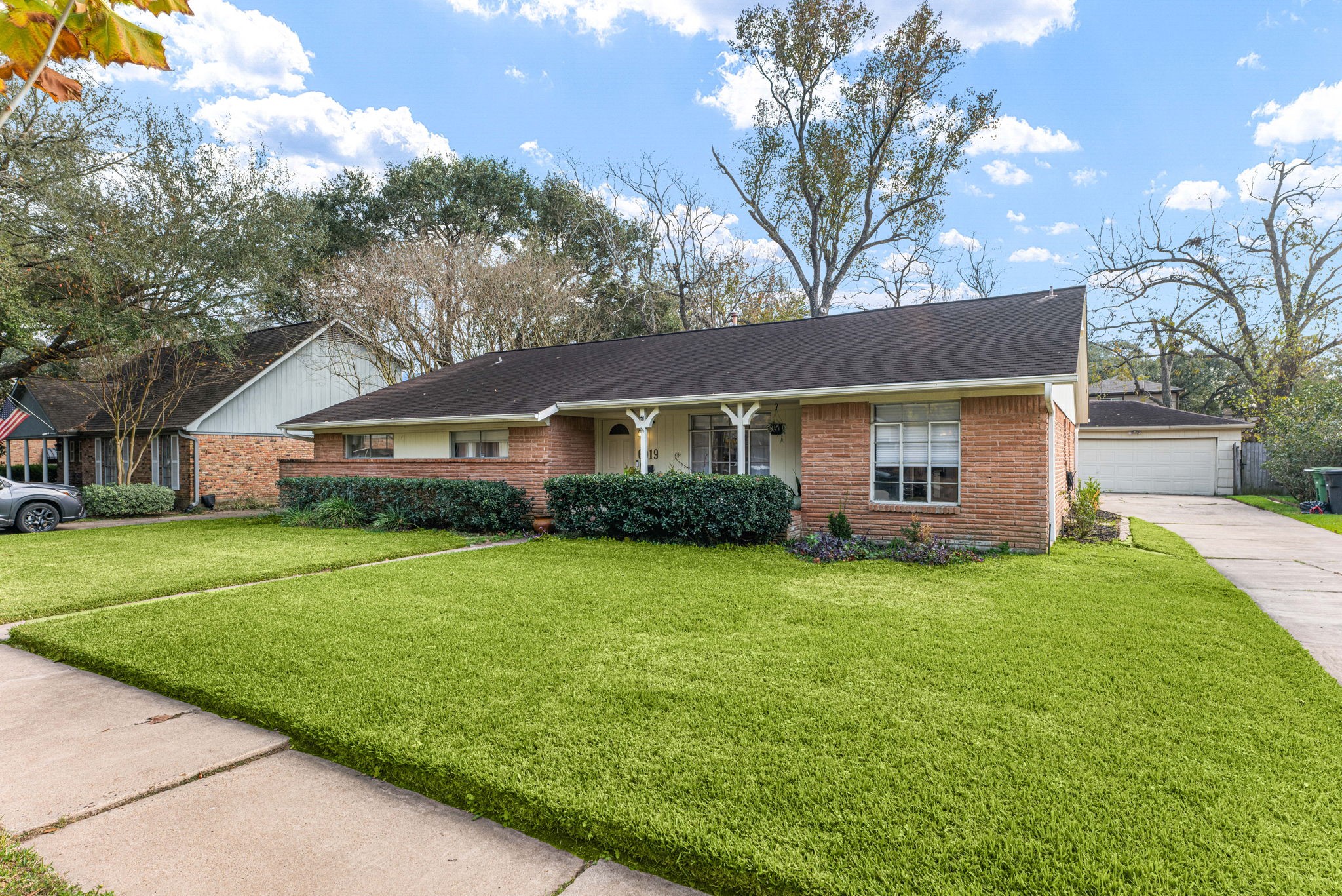 6019 Cartagena Street Houston, TX 77035 - Photo 2 of 29 a front view of house with yard and green space