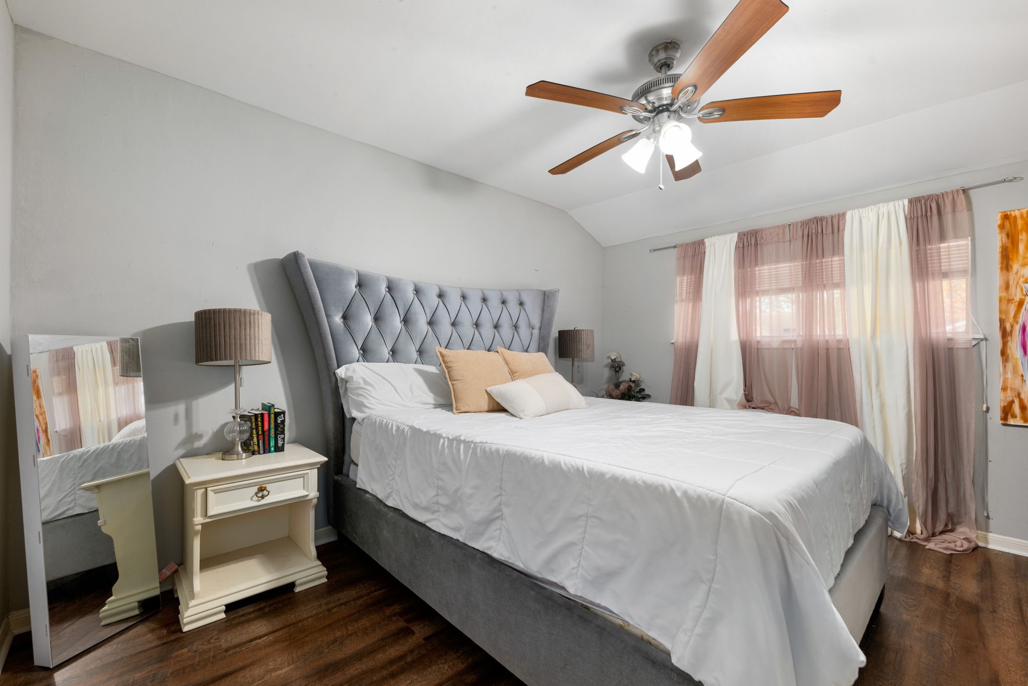6019 Cartagena Street Houston, TX 77035 - Photo 23 of 29 a bedroom with a bed and a ceiling fan