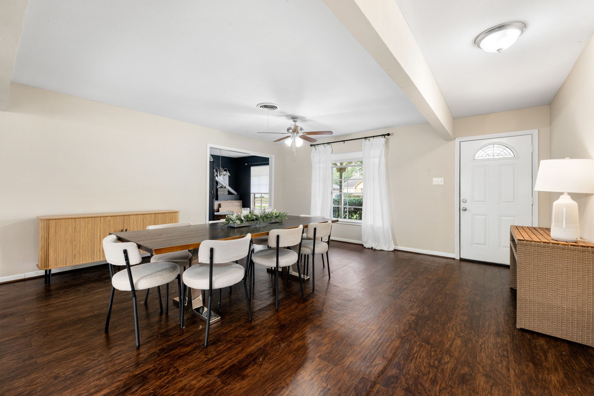 6019 Cartagena Street Houston, TX 77035 - Photo 3 of 29 a view of a dining room with furniture and wooden floor