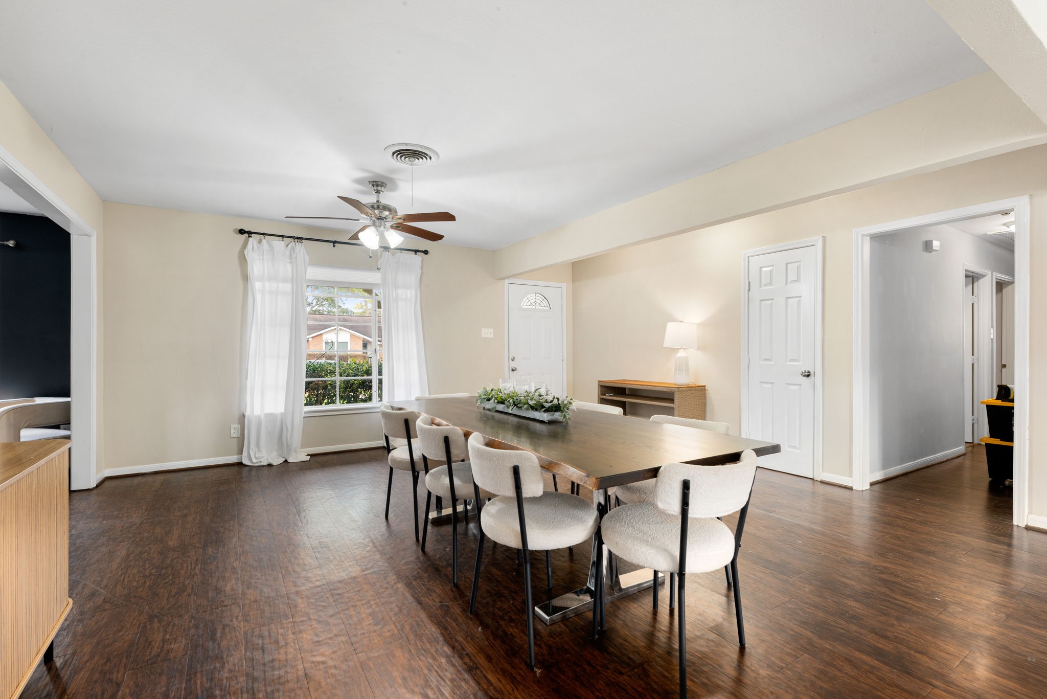 6019 Cartagena Street Houston, TX 77035 - Photo 5 of 29 a view of a a dining room with furniture window and wooden floor
