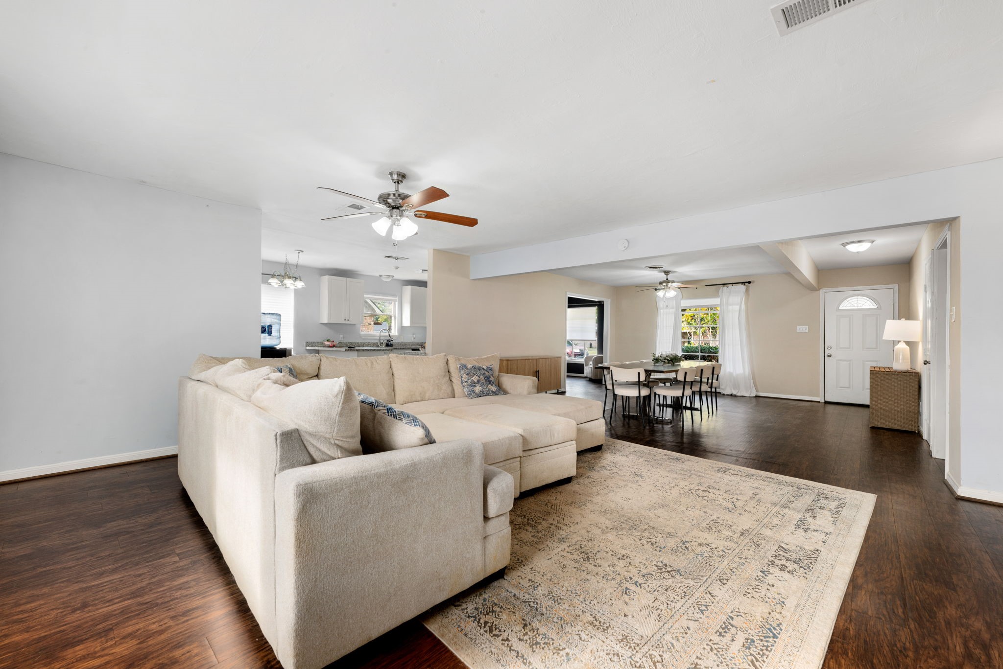 6019 Cartagena Street Houston, TX 77035 - Photo 8 of 29 a living room with furniture and a wooden floor