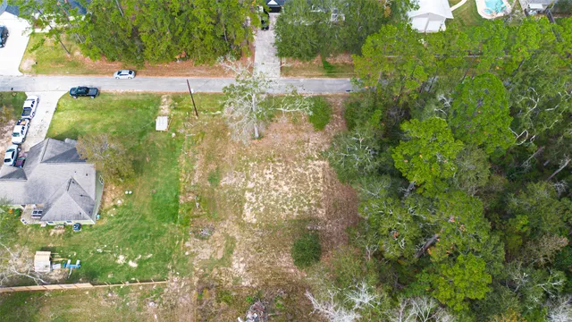 a backyard of a house with lots of green space