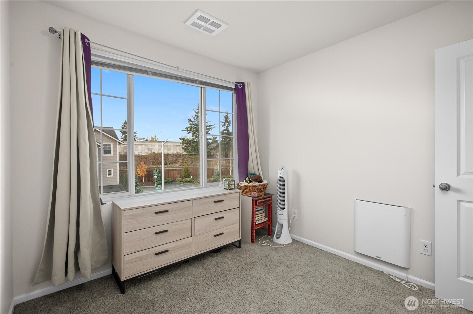 3322 31st Drive Everett, WA 98201 - Photo 22 of 34 a room with a dresser and a window