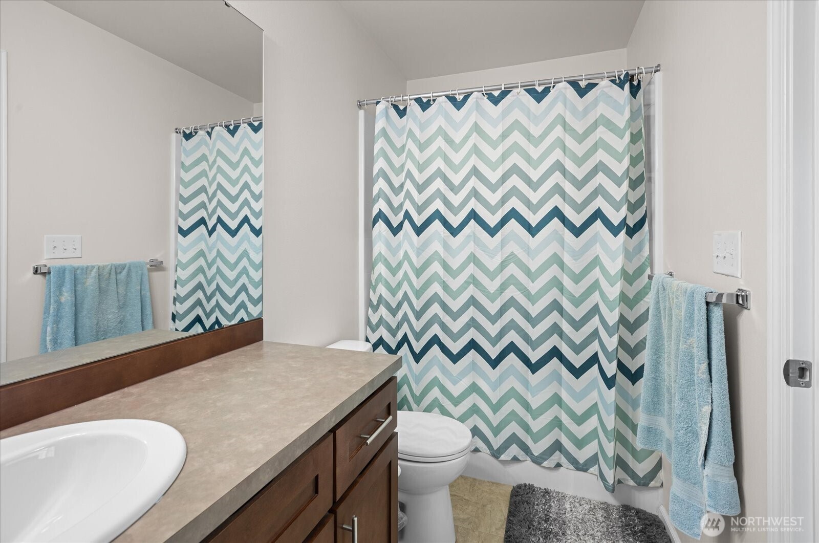 3322 31st Drive Everett, WA 98201 - Photo 29 of 34 a bathroom with a granite countertop sink and a toilet