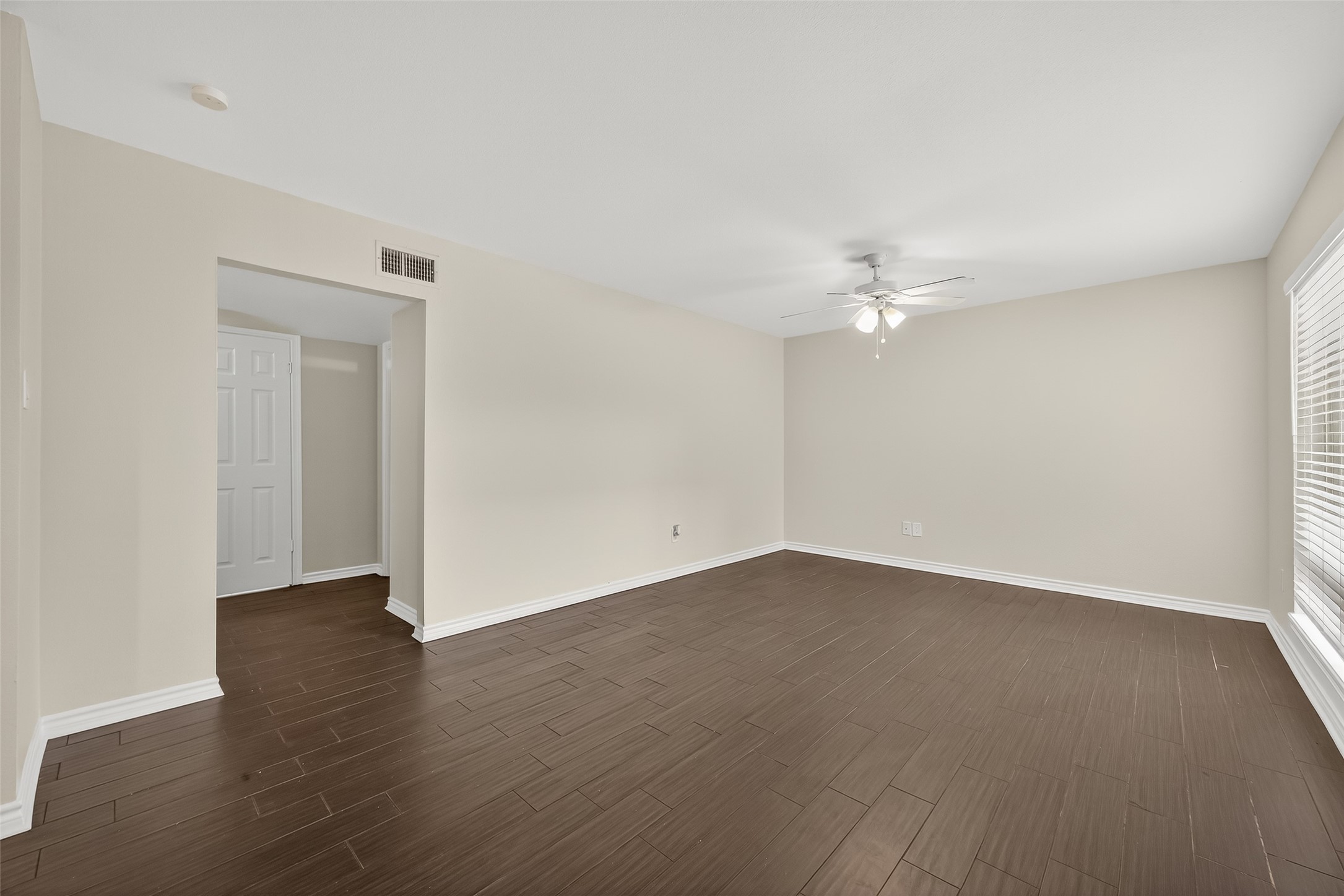 2020 Huldy Street, Unit 2 Houston, TX 77019 - Photo 14 of 34 a view of an empty room with wooden floor