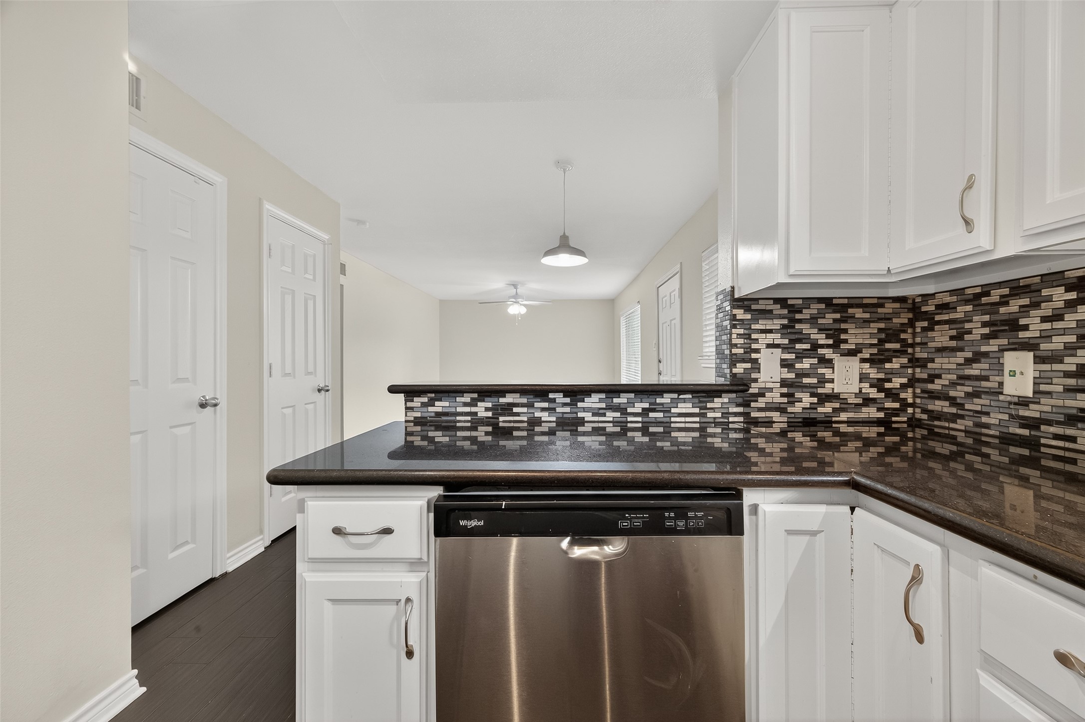 2020 Huldy Street, Unit 2 Houston, TX 77019 - Photo 21 of 34 a kitchen with granite countertop a sink dishwasher a stove and a refrigerator