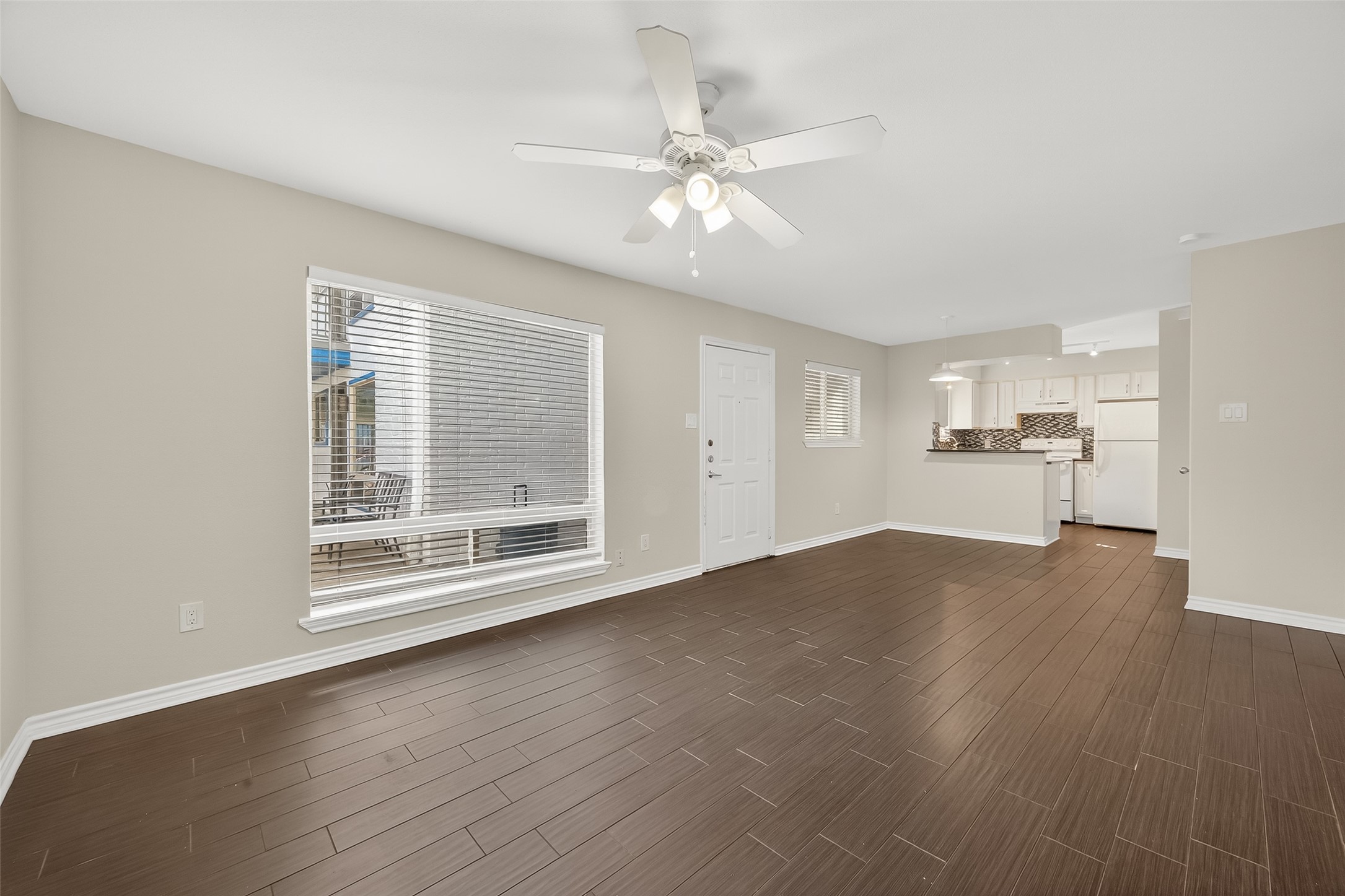2020 Huldy Street, Unit 2 Houston, TX 77019 - Photo 10 of 34 a view of empty room with wooden floor and fan