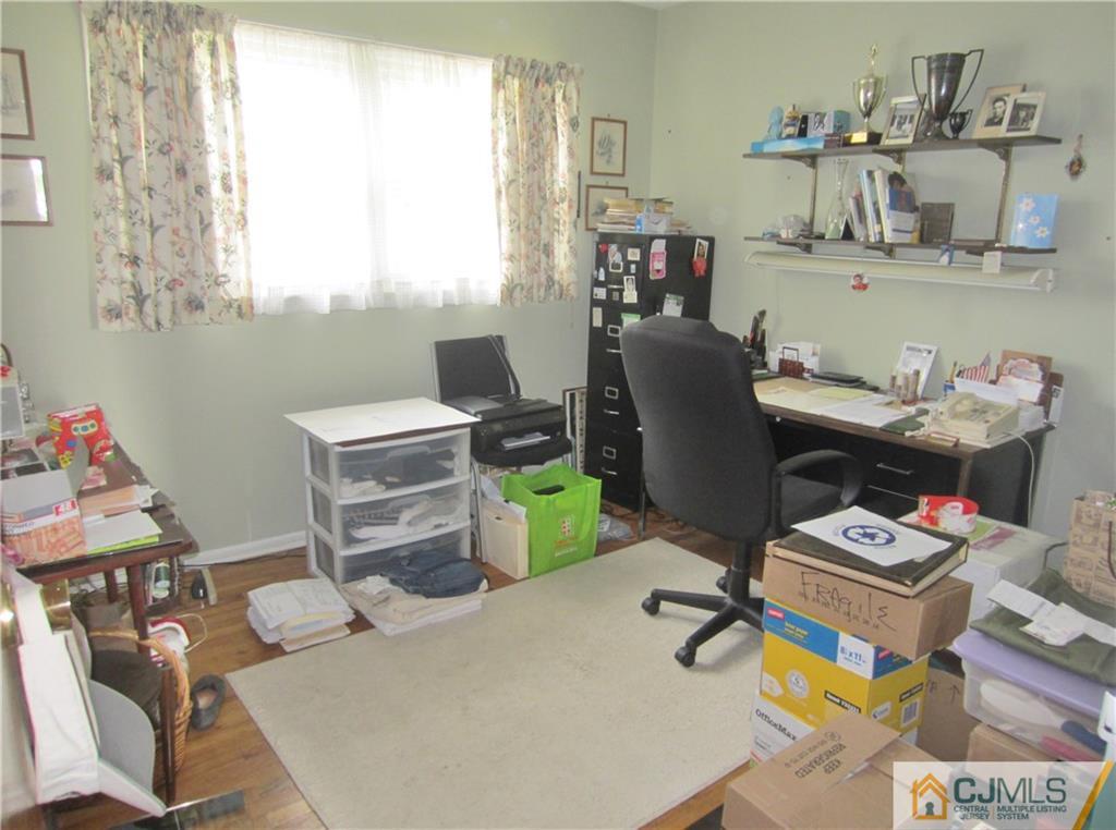 336 Old Post Road Edison, NJ 08817 - Photo 11 of 15 a work room with furniture and a window