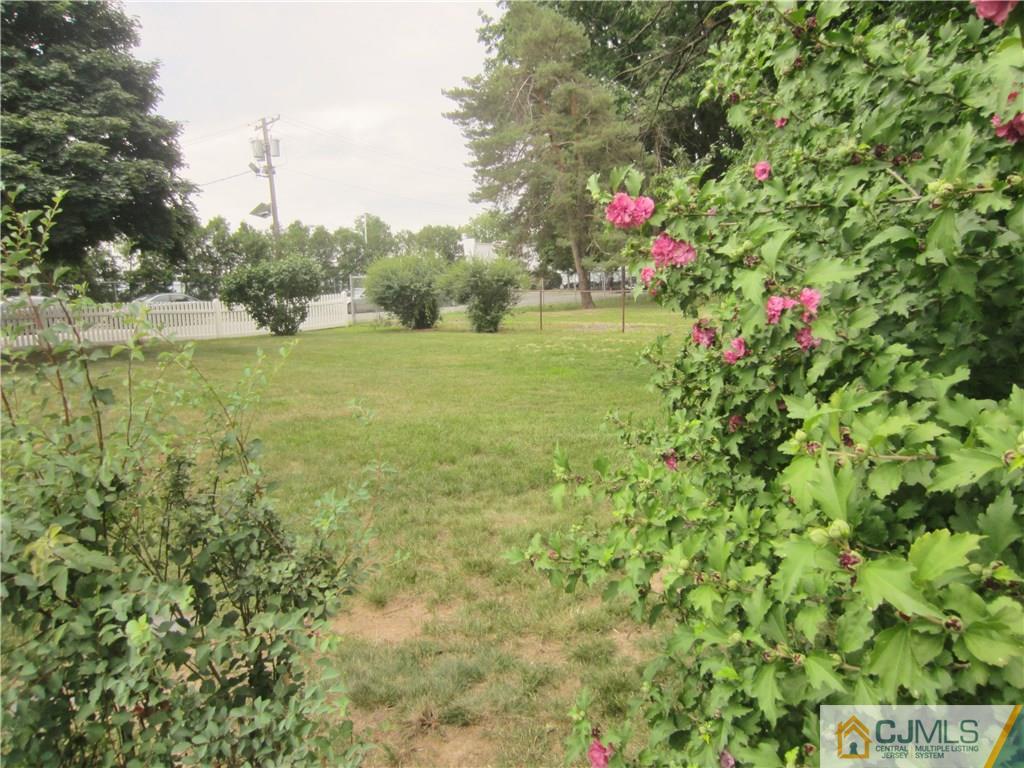 336 Old Post Road Edison, NJ 08817 - Photo 14 of 15 a view of a flower garden in a backyard