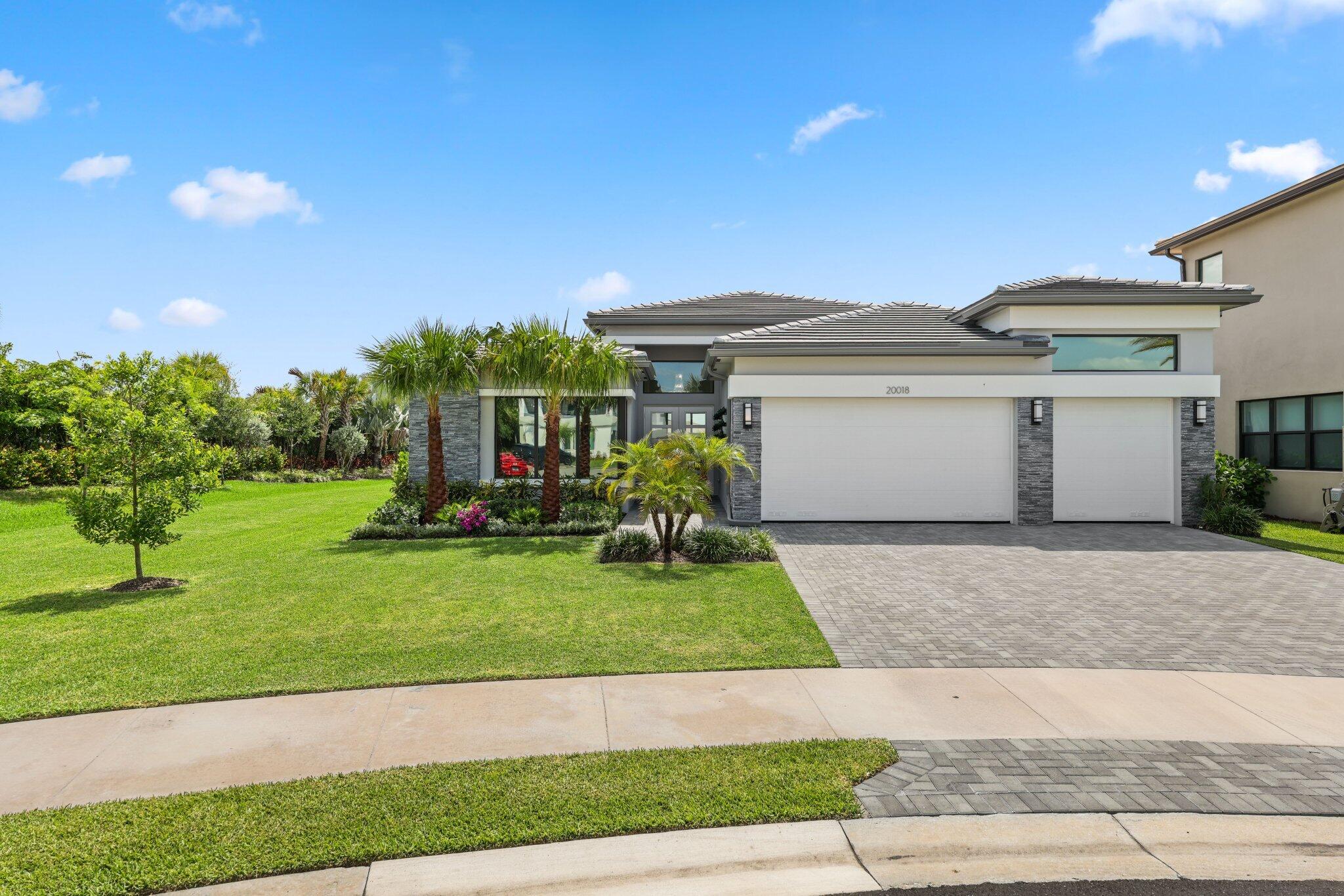 20018 Cabot Clfs Court Boca Raton, FL 33434 - Photo 3 of 70 front 3