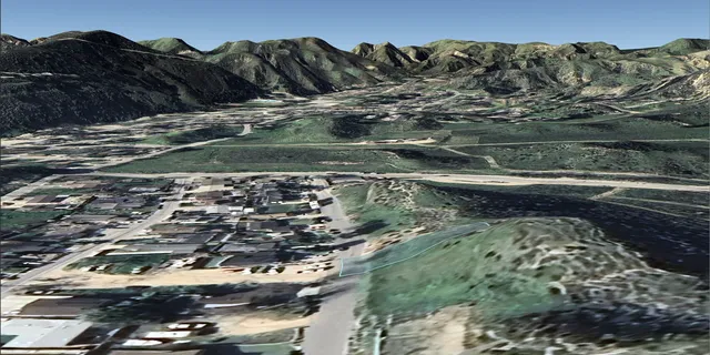 a view of a back yard of a house