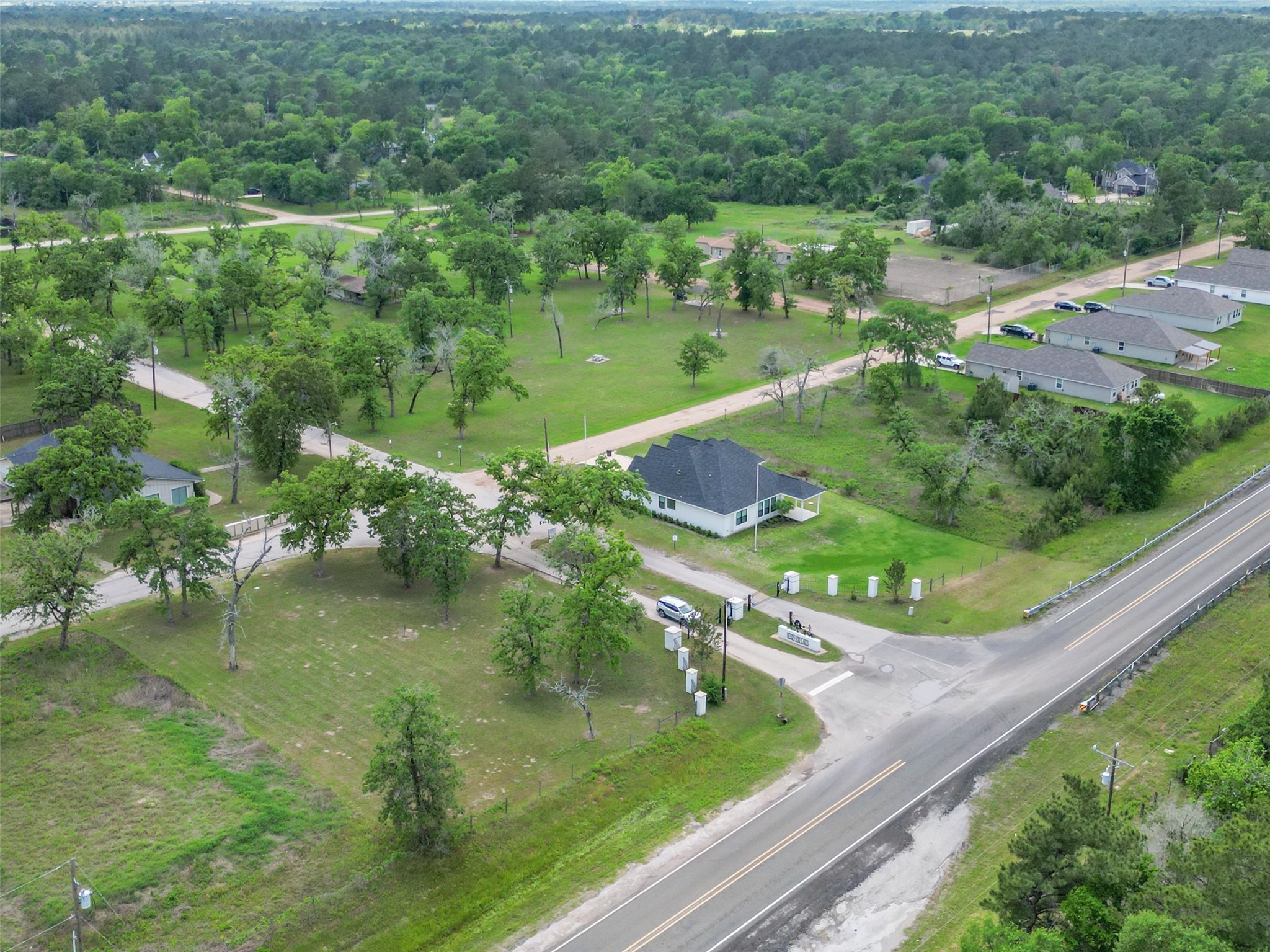 38006 Park View Drive Hempstead, TX 77445 - Photo 24 of 34 a view of a lake with huge green field