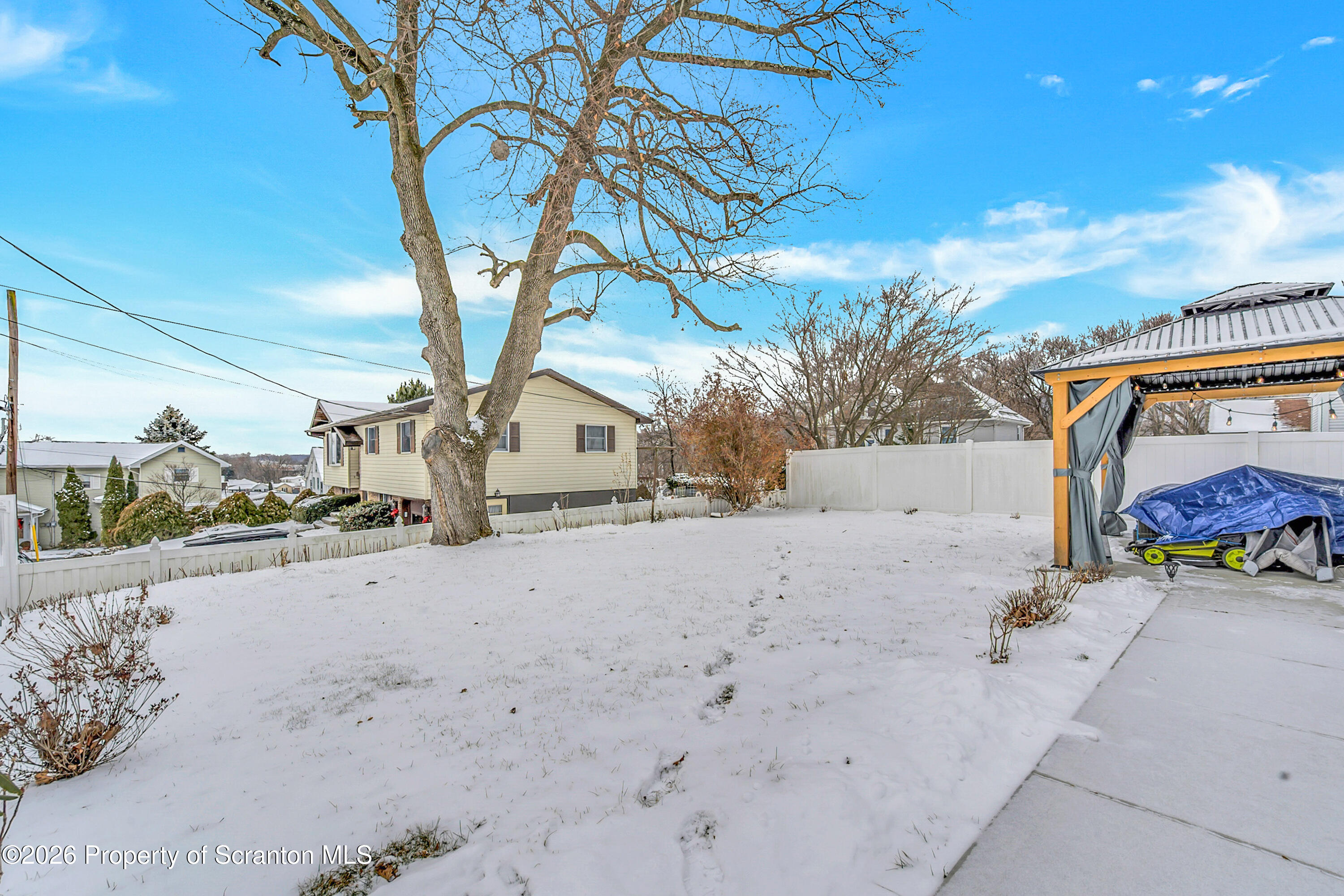 1803 Academy Street Scranton, PA 18504 - Photo 16 of 47 a view of a road with a tree in the background