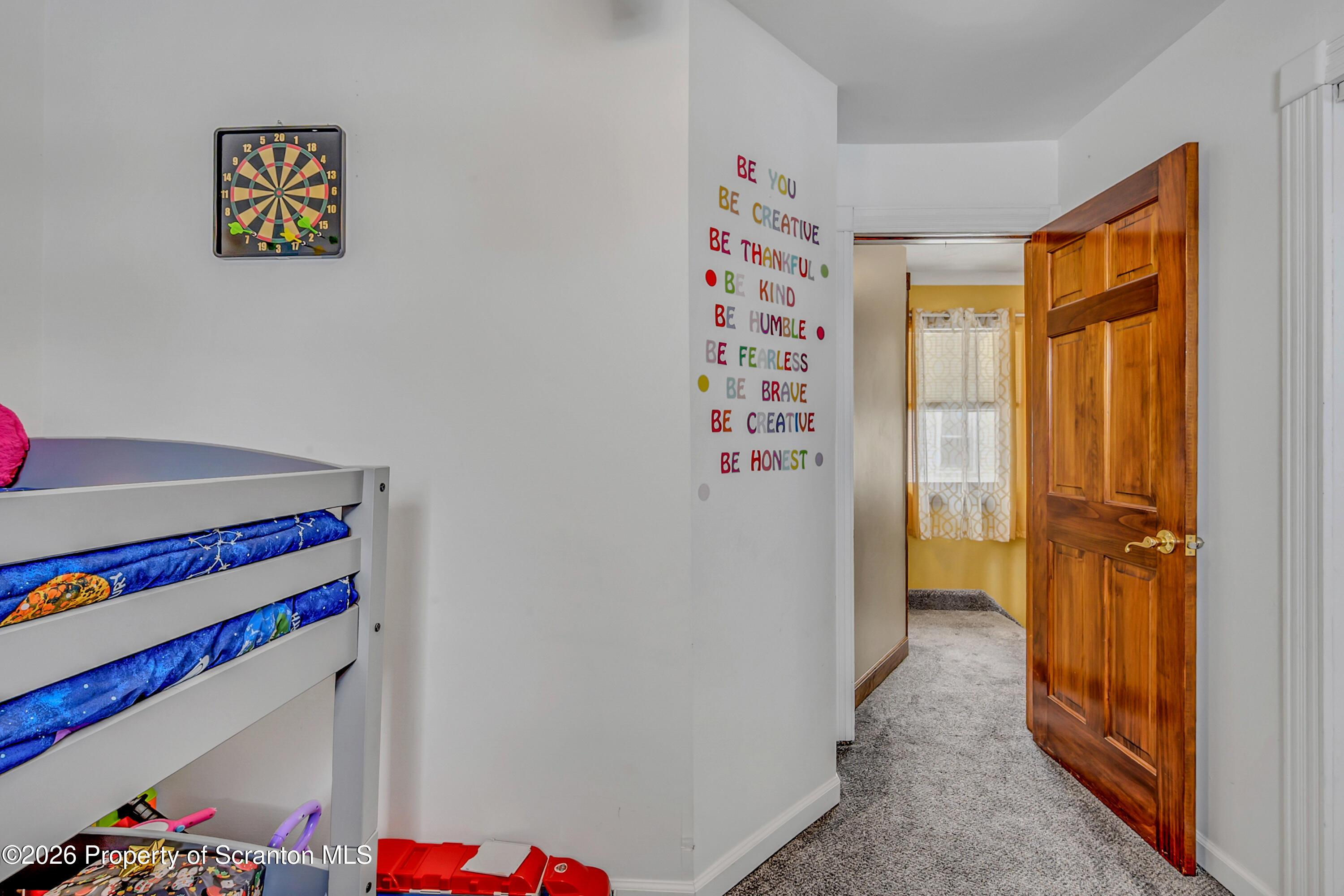 1803 Academy Street Scranton, PA 18504 - Photo 19 of 47 a view of hallway with toys and a closet