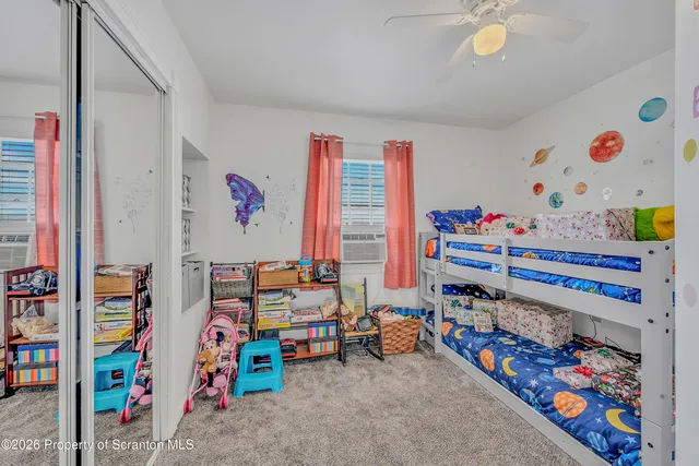 a kitchen with granite countertop a sink and a stove