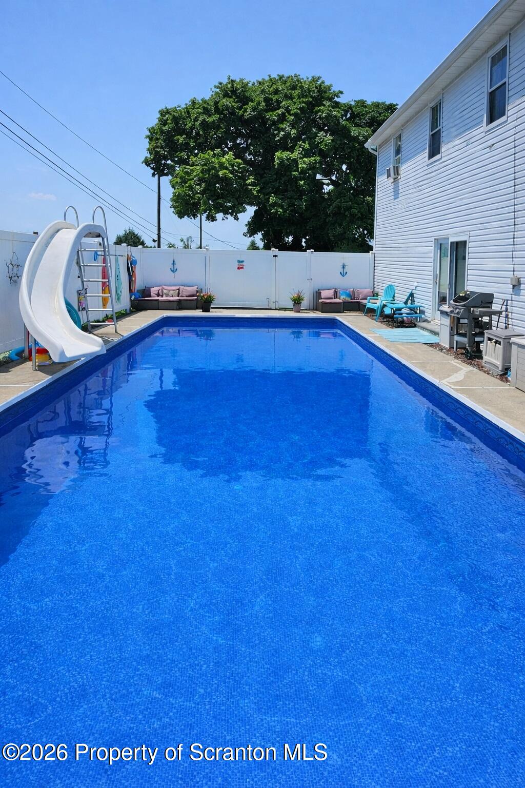 1803 Academy Street Scranton, PA 18504 - Photo 22 of 47 a kitchen with granite countertop a sink and a stove