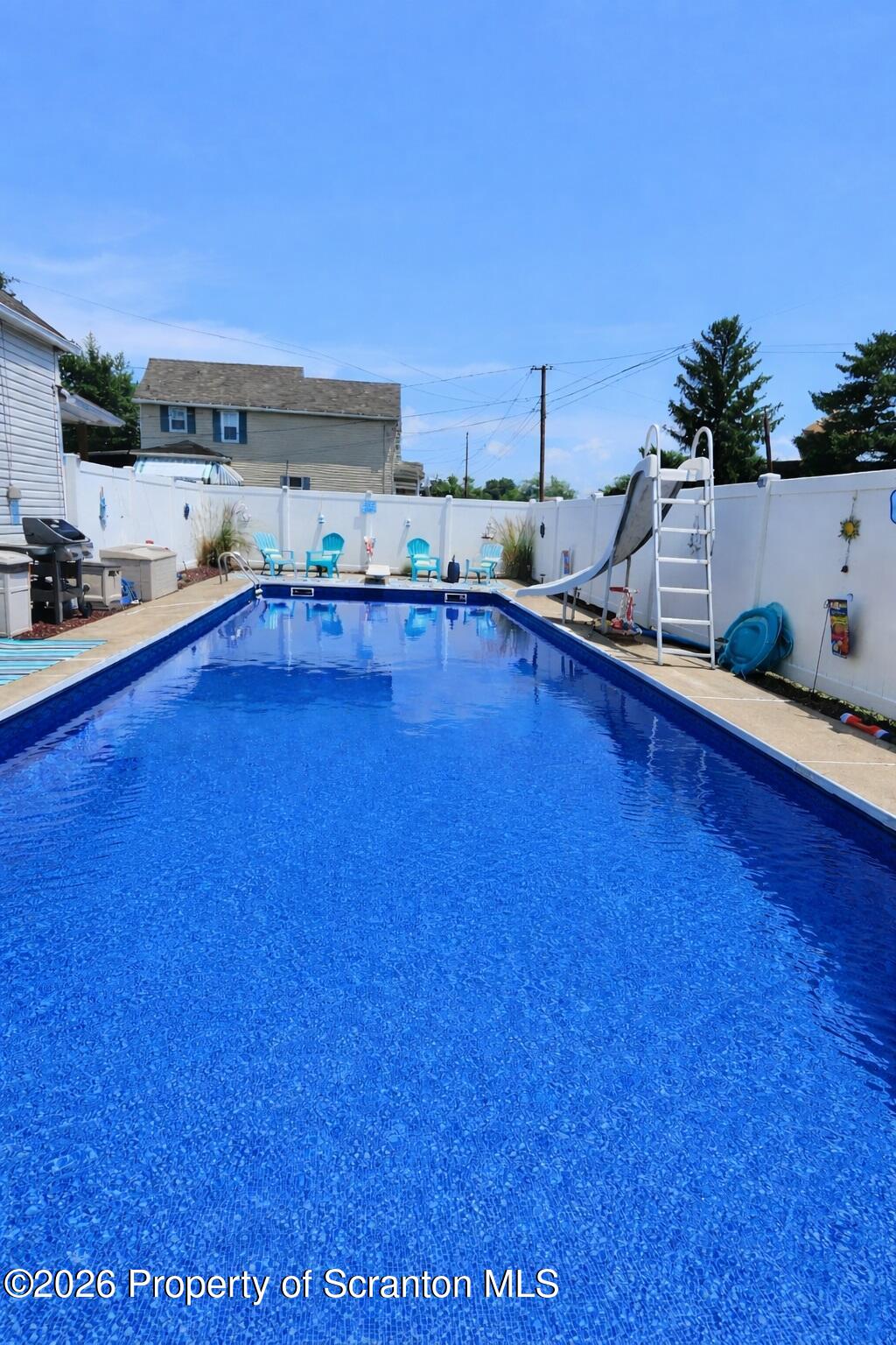 1803 Academy Street Scranton, PA 18504 - Photo 28 of 47 a kitchen with stainless steel appliances a sink a stove and white cabinets