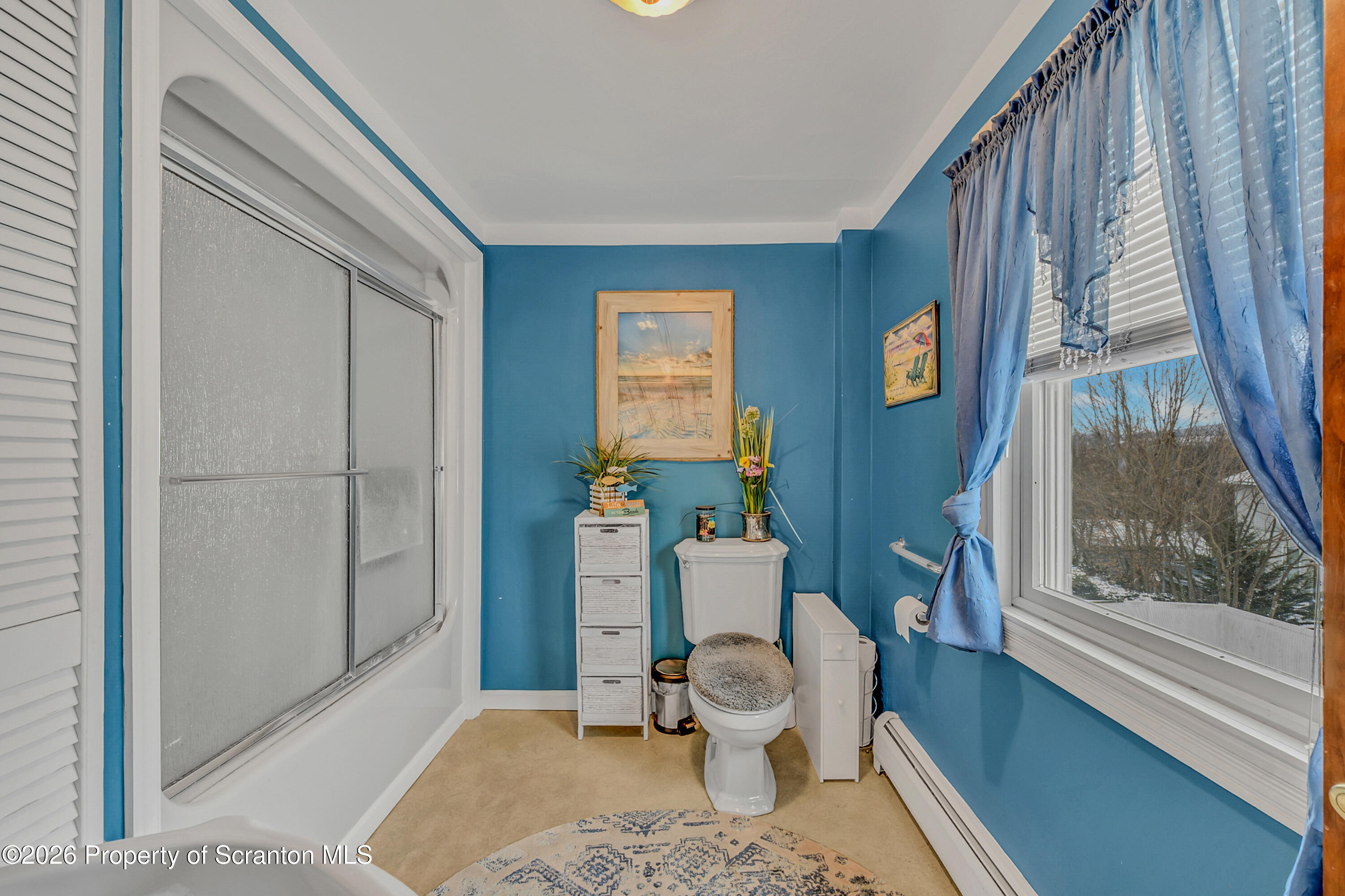 1803 Academy Street Scranton, PA 18504 - Photo 31 of 47 a living room with a couch and a table