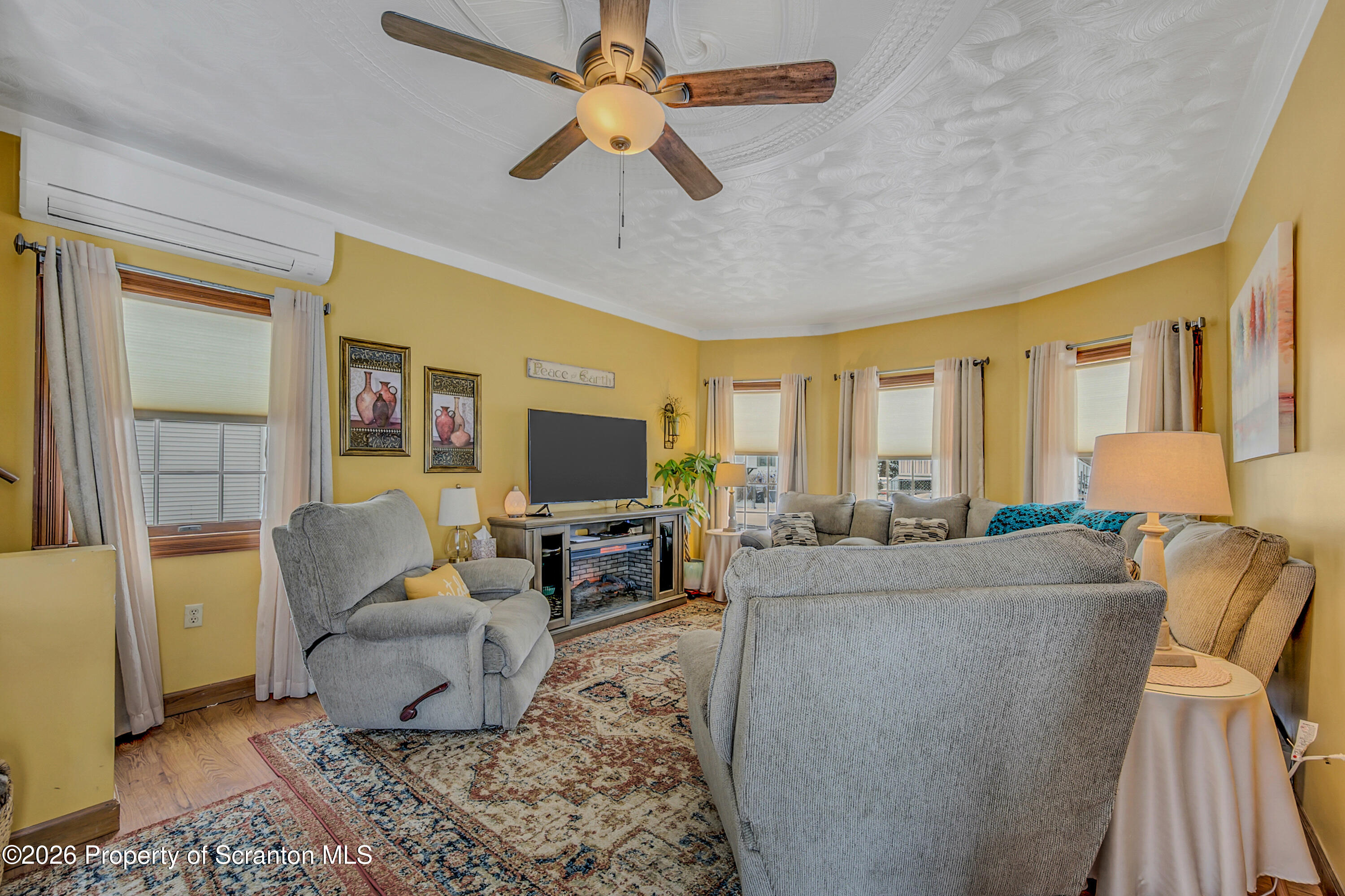 1803 Academy Street Scranton, PA 18504 - Photo 4 of 47 a living room with furniture and a flat screen tv