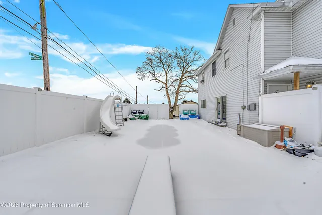 a house with garden in front of it