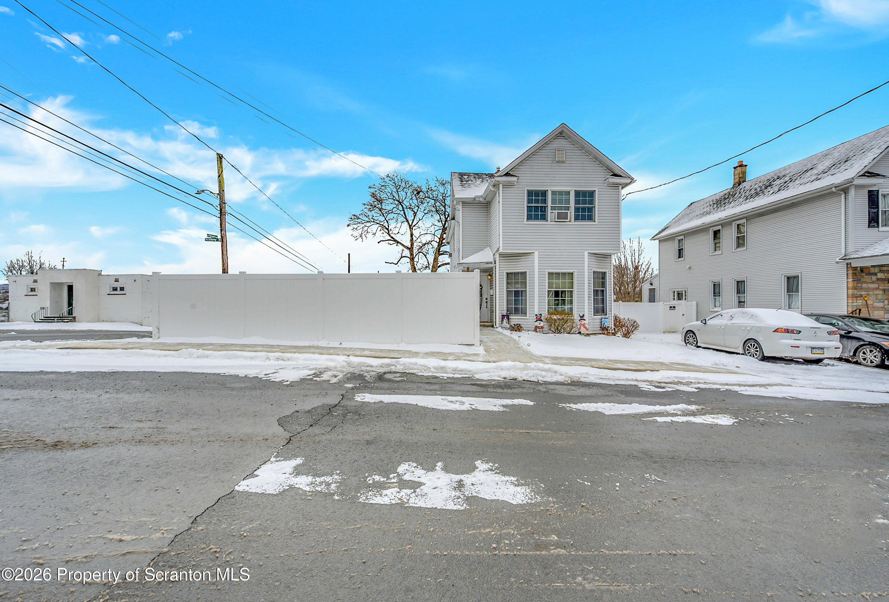 1803 Academy Street Scranton, PA 18504 - Photo 6 of 47 a front view of a house with a yard