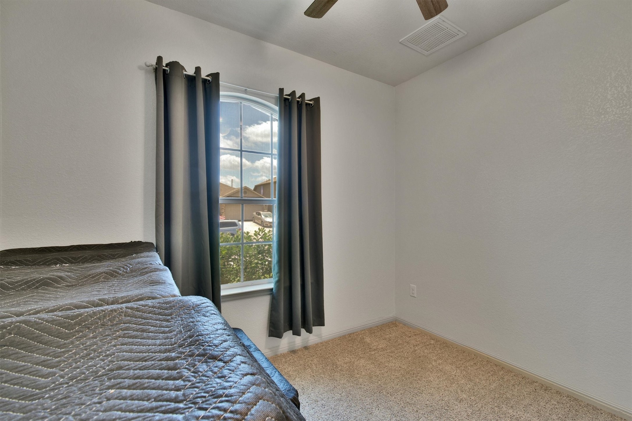 324 Shiner Lane Georgetown, TX 78626 - Photo 14 of 39 a view of a big room with wooden floor and windows