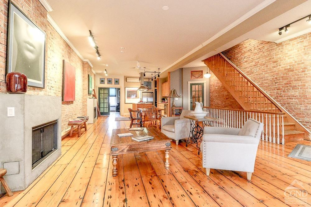258 Warren Street Hudson, NY 12534 - Photo 2 of 31 a balcony with wooden floor and breakfast area