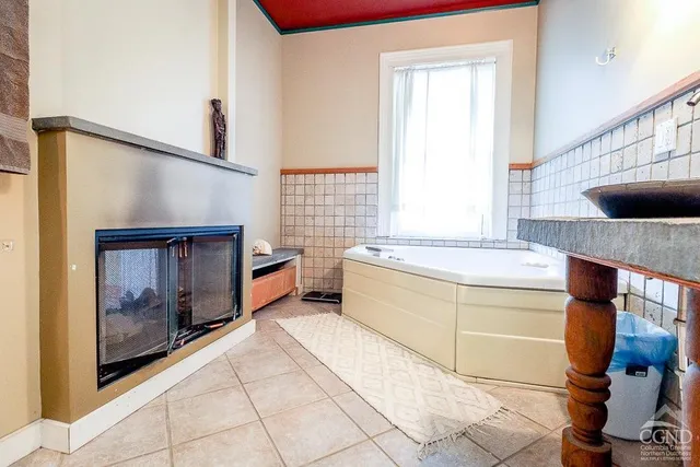 a view of balcony with wooden floor