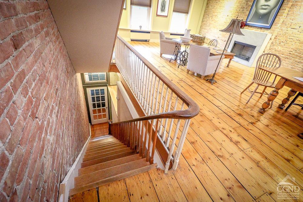 258 Warren Street Hudson, NY 12534 - Photo 26 of 31 a view of balcony with wooden floor