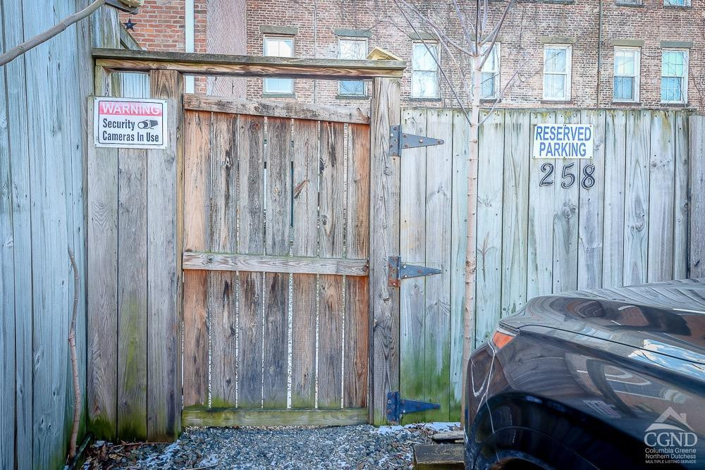 258 Warren Street Hudson, NY 12534 - Photo 27 of 31 a bedroom with a bed and a window