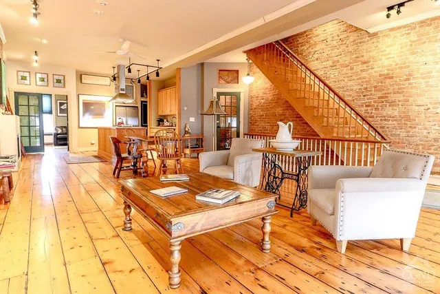 a view of a living room and dining room