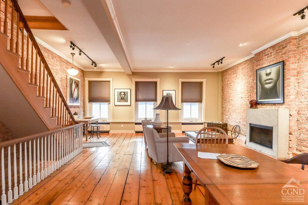 258 Warren Street Hudson, NY 12534 - Photo 5 of 31 a view of a living room and dining room