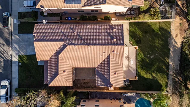a view of multiple houses with a city street