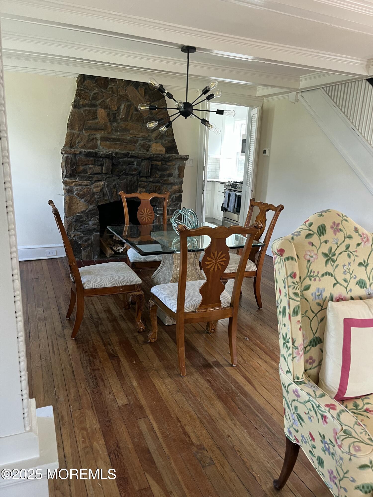 404 Lake Drive Allenhurst, NJ 07711 - Photo 5 of 8 a living room with furniture and a fireplace