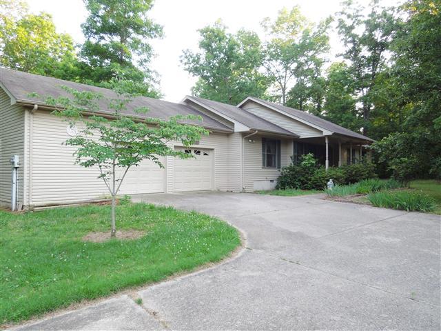 220 Leon Cole Road Dover, TN 37058 - Photo 1 of 20 Nice Ranch Home sitting private on 32 acres.