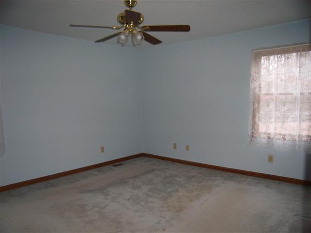 220 Leon Cole Road Dover, TN 37058 - Photo 11 of 20 Master bedroom, ceiling fan, carpet, good closet space, adjoining bath