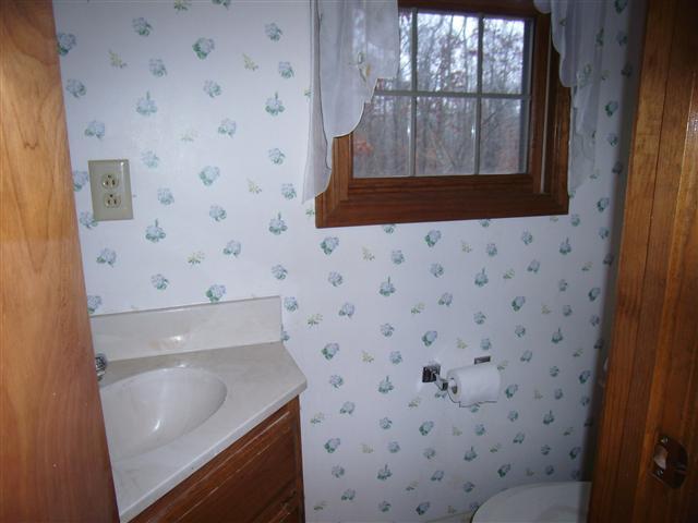 220 Leon Cole Road Dover, TN 37058 - Photo 16 of 20 Half bath, off of kitchen area and at laundry area