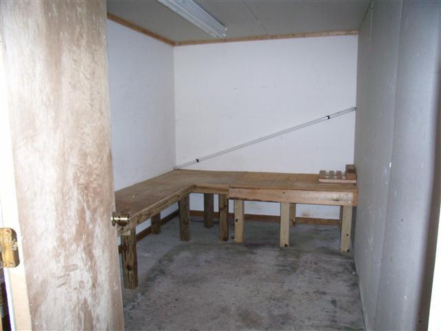 220 Leon Cole Road Dover, TN 37058 - Photo 20 of 20 Hobby room inside garage. Previously used for beekeeping - honey storage. Perfect for gun shop, hobby room, etc...