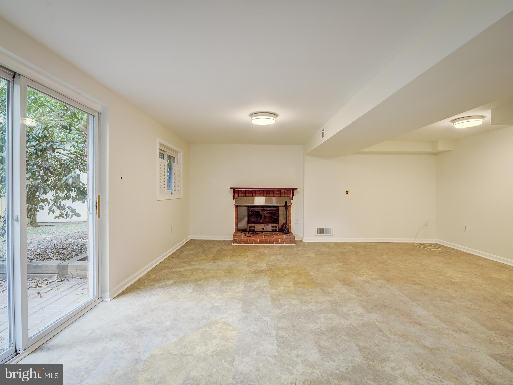 6807 Quebec Court Springfield, VA 22152 - Photo 41 of 59 Rec room has sliding door leading to brick patio