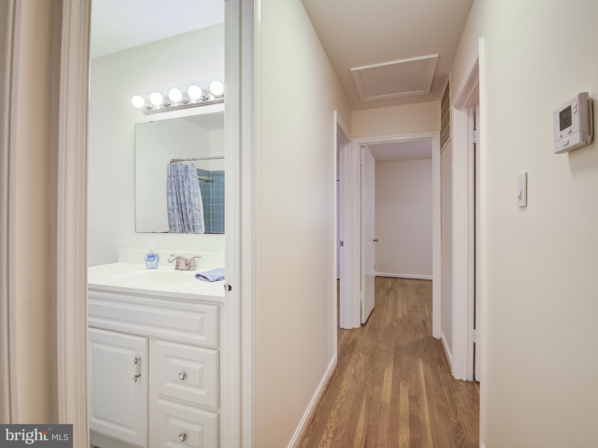 6807 Quebec Court Springfield, VA 22152 - Photo 6 of 59 Upper hallway to hall bath and 3 bedrooms