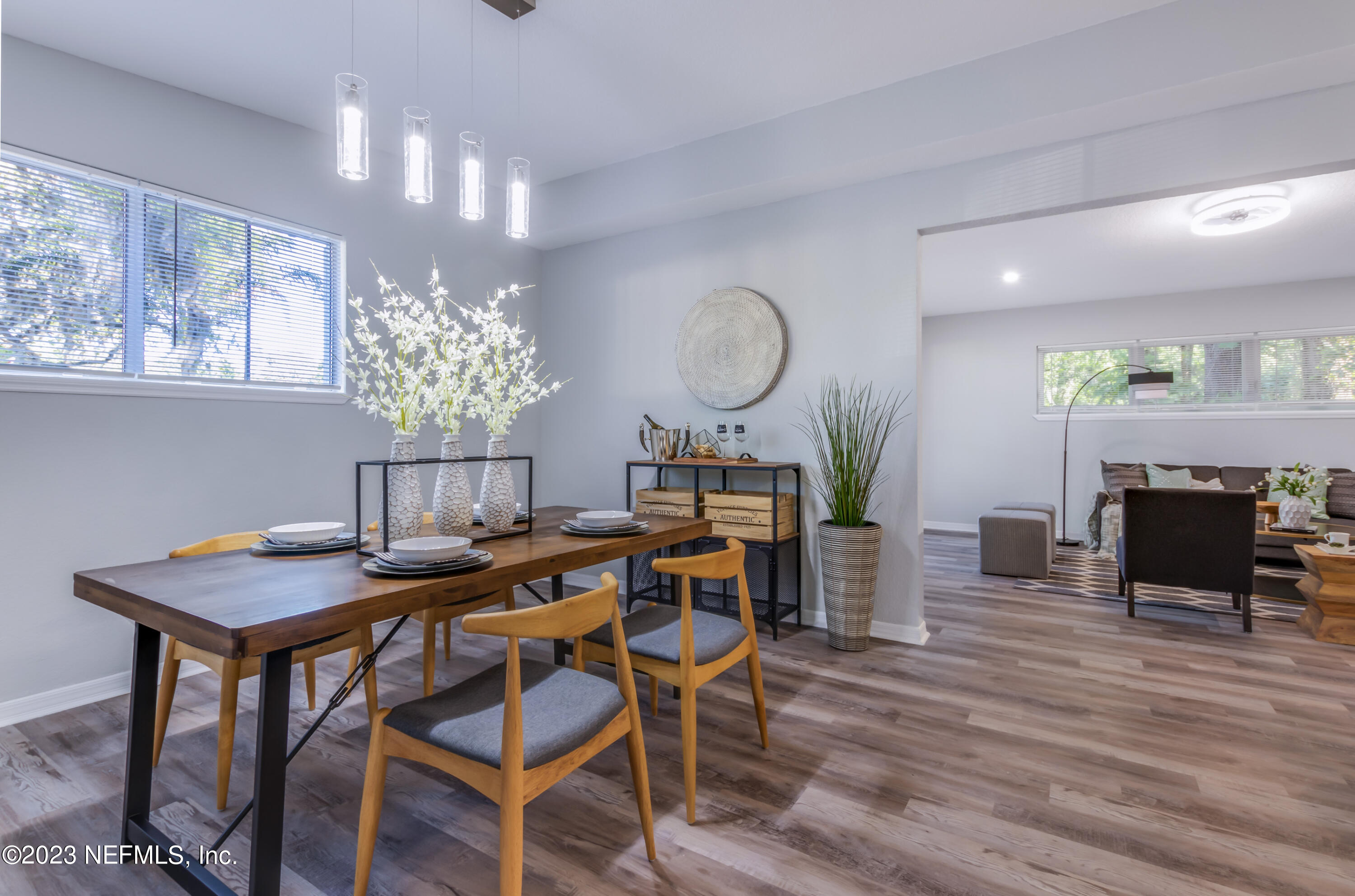 1226 Morgana Road Jacksonville, FL 32211 - Photo 17 of 38 a view of a dining room with furniture and wooden floor